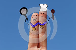 Two fingers painted as a cookers