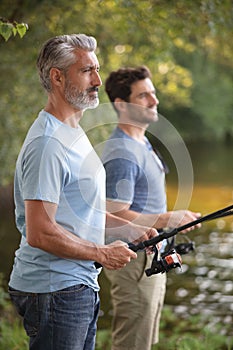 two fishermen preparing for fishing