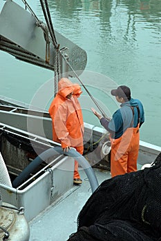 Two fishermen talking