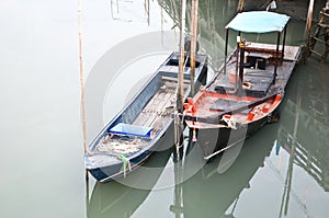 Two fishing boats anchor in the dock