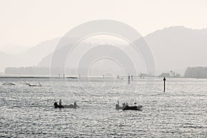 Two fishing boats on a lake in Idaho.