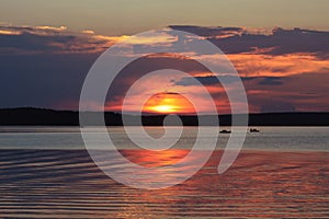 Two fishing boats on lake Seliger at sunset