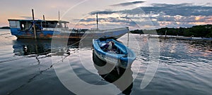 two fishing boats parked on the shore of Melasti, Sanur