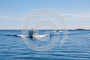 Two Fishing Boats Speeding Toward Camera