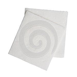 Two folded pieces of white tissue paper or napkin in stack tidily prepared for use in toilet or restroom isolated on white photo