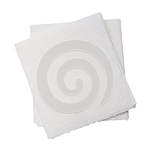 Two folded pieces of white tissue paper or napkin in stack tidily prepared for use in toilet or restroom isolated on white photo