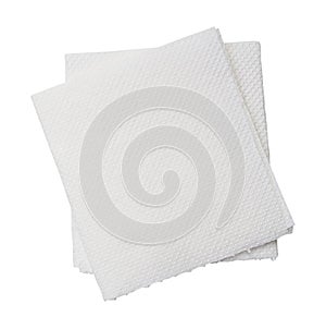 Two folded pieces of white tissue paper or napkin in stack tidily prepared for use in toilet or restroom isolated on white