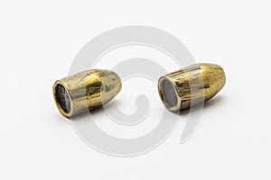 Two forensics ballistics rifling marks on bullet also known as land impressions and groove impressions photo