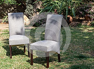 Two formal chairs isolated outdoors