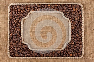 Two frames made of rope with coffee beans on sackcloth