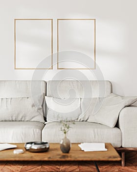 two frames mock up on white wall with sunlight in living room interior with gray sofa and coffee table with decor, 3d