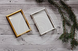 Two frames for photos on a light, vintage wooden background