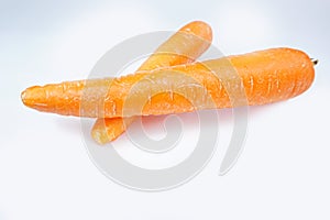 Two Fresh carrots isolated on white background