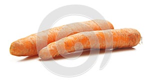 Two fresh carrots on a white background