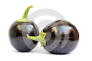 Two fresh eggplants isolated on white