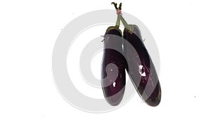 two fresh eggplants, isolated on white background