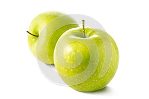 Two fresh green apple isolated on white background.