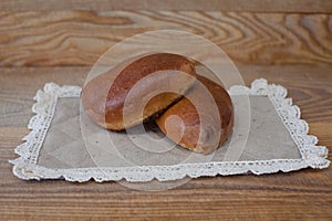 Two fresh pies on a wooden board