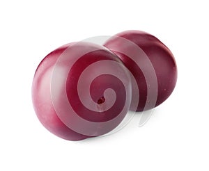 Two fresh ripe plums isolated on white