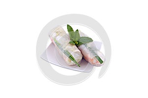 Two fresh shrimp spring rolls on white plate