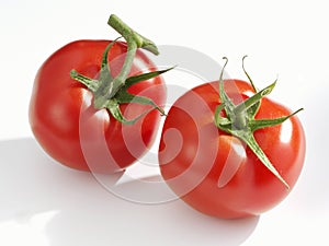 Two fresh tomatoes