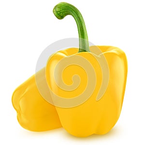 Two fresh yellow bell peppers on a white background