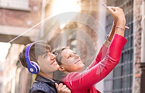 Two Friends making selfie. Two beautiful women making selfie