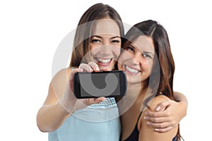 Two friends showing a blank smart phone screen