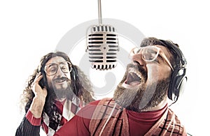 Two friends singing a karaoke photo