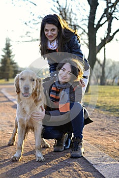 Two friends walking the dog