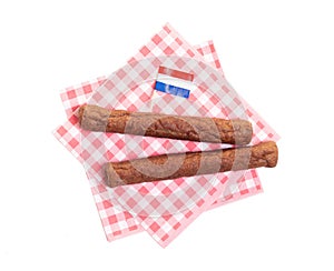 Two frikadellen on a napkin, a Dutch fast food snack