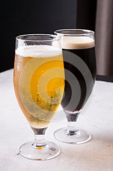 Dark and light beer glasses on a table