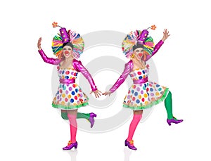 Two funny clowns dancing