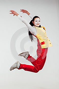 Two funny mimes jumping on white background