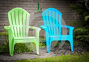 Two Garden Deck Chairs Blue and Green In Pleasant Garden Spot