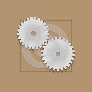 Two gears on a brown background.