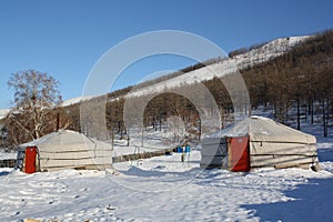 Two gers (tents) in the silence of long winter, Bogd Khaan region, Mongolia.