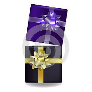 Two gift boxes with ribbons on the white background.