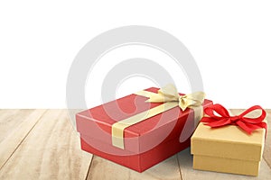 two gift boxes on wooden desk top isolated on white backgroun