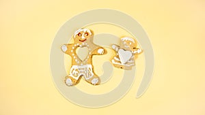 Two gingerbread man. Gingerbread made by children. White human heart stolen by a gingerbread girl. Homemade cookies