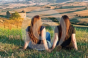 Two girl on meadow