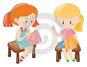 Two girl sewing handkerchief