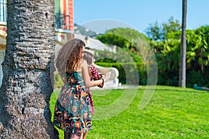 Two girl talking and laughing on their smartphone