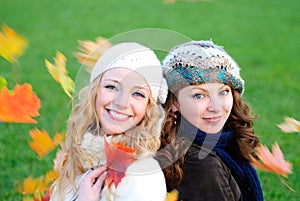 Two girl under the maple tree photo