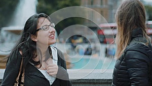 Two girlfriends on a sightseeing trip to London