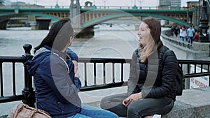 Two girlfriends on a sightseeing trip to London