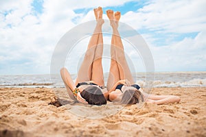 Two girlfriends on the summer beach