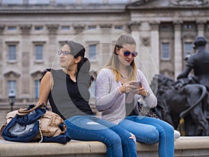 Two girlfriends travel to London