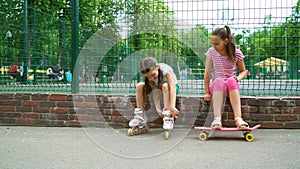 Two girls active passtime in park