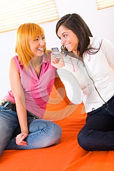 Two girls with cellphone